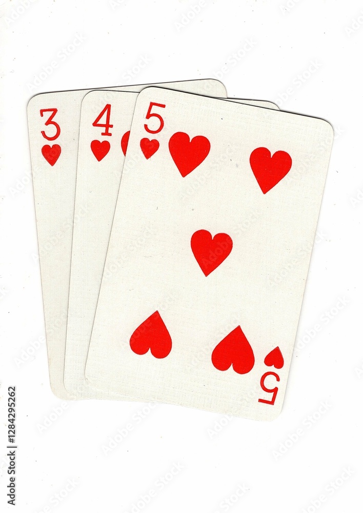 A hand of playing cards showing a run of three on a white background. A hand of playing cards showing a run of three on a white background.