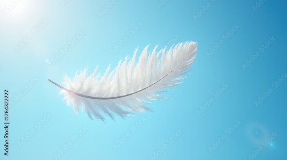 Obraz premium White feather floating mid-air against a bright blue sky, softly illuminated by sunlight, symbolizing freedom and lightness.