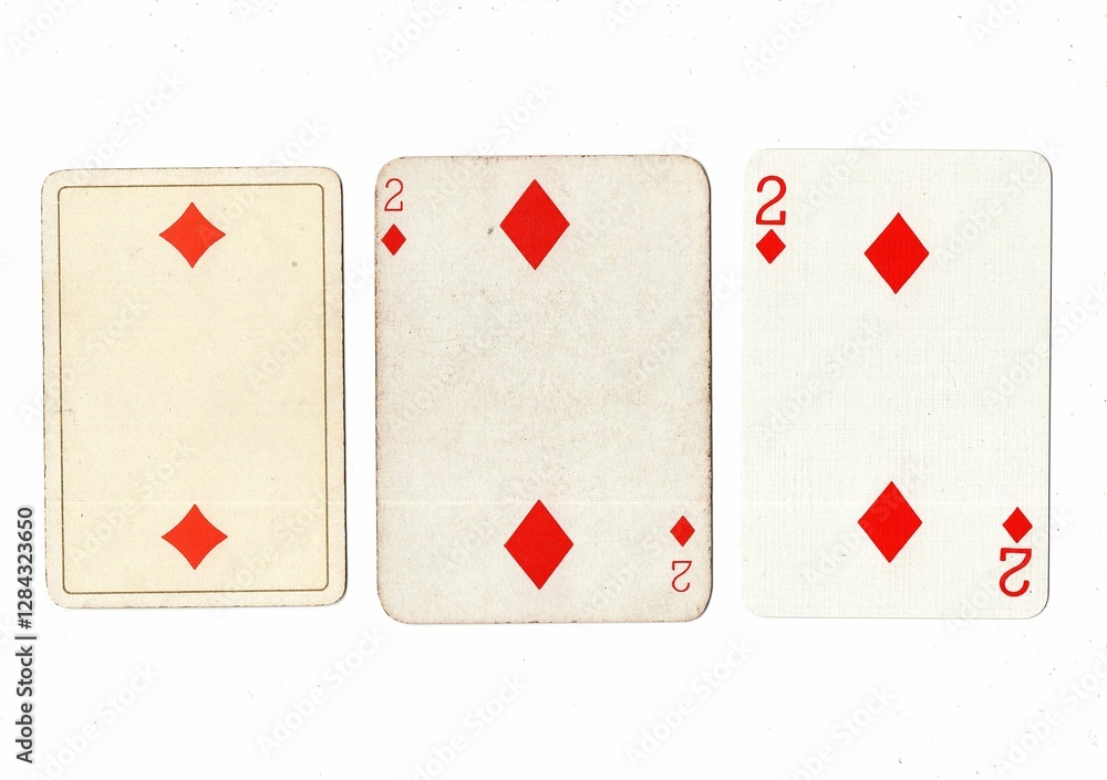 Obraz premium Vintage playing cards in three different designs showing the same value.