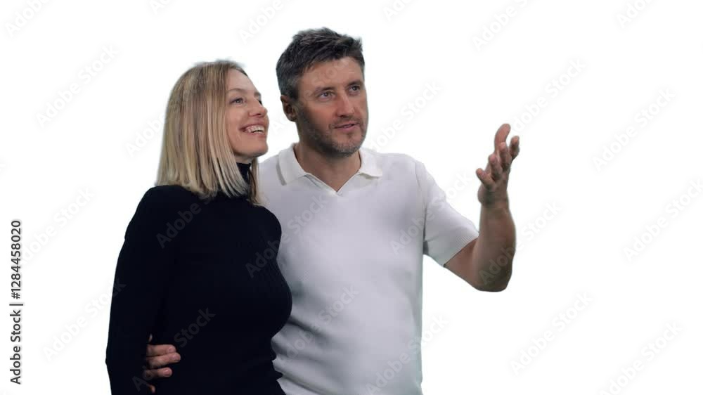 Close-up of adult man and woman looking at something and discussing, Full HD footage with alpha transparency channel isolated on white background Close-up of adult man and woman looking at something and discussing, Full HD footage with alpha transparency channel isolated on white background