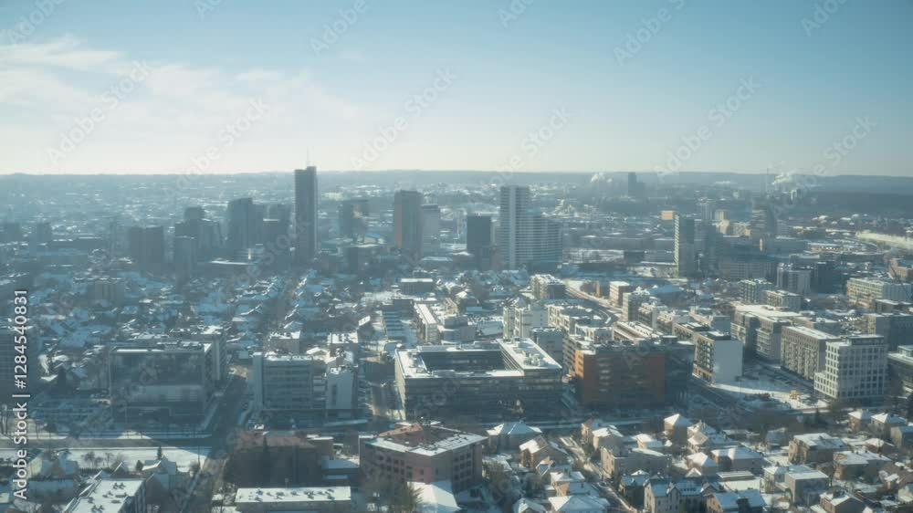 Winter city aerial view, downtown, cityscape of Vilnius, Lithuania, drone snow covered cold city Winter city aerial view, downtown, cityscape of Vilnius, Lithuania, drone snow covered cold city