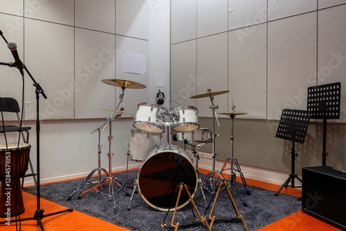 Obraz na plátně White drum set with cymbals in a music rehearsal room with acoustic panels, micr