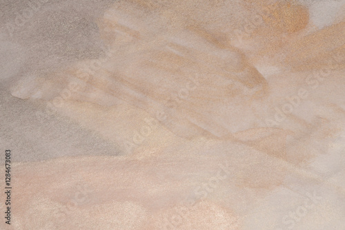 Metallic Ink watercolor grain pour blot on beige empty paper blank texture background. Silver, nacre, gold, beige neutral tone.