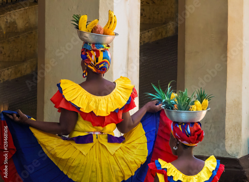 Palenqueras in the old town of Cartagena, Colombia. They perpetuate a centuries old tradition established by freed slave women from San Basilio de Palenque