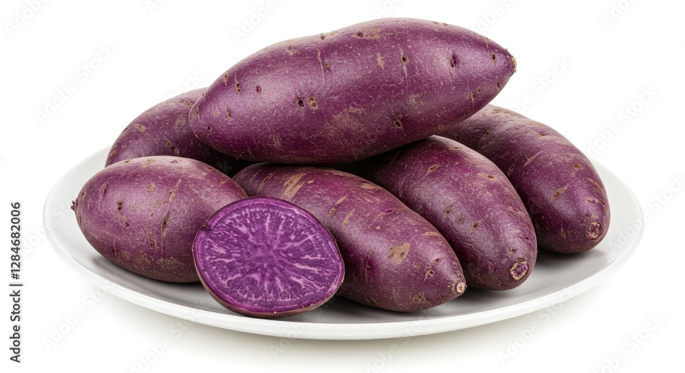 Pile of Vibrant Purple Sweet Potatoes on White Plate for Cooking Pile of Vibrant Purple Sweet Potatoes on White Plate for Cooking