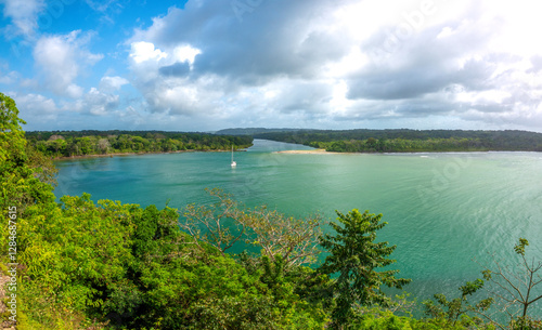 Photography View of mouth of the Chagres river as it joins the Atlantic Ocean in front of th