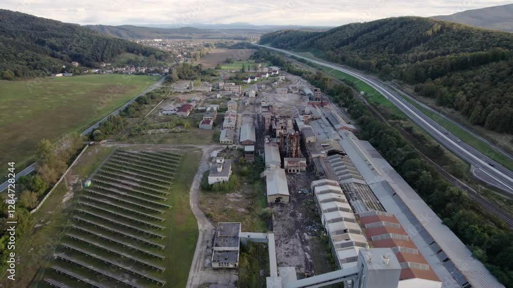 An old destroyed chemical factory from the times of socialism. Devastated buildings, Lovinobaňa, Slovakia. Drone footage. An old destroyed chemical factory from the times of socialism. Devastated buildings, Lovinobaňa, Slovakia. Drone footage.
