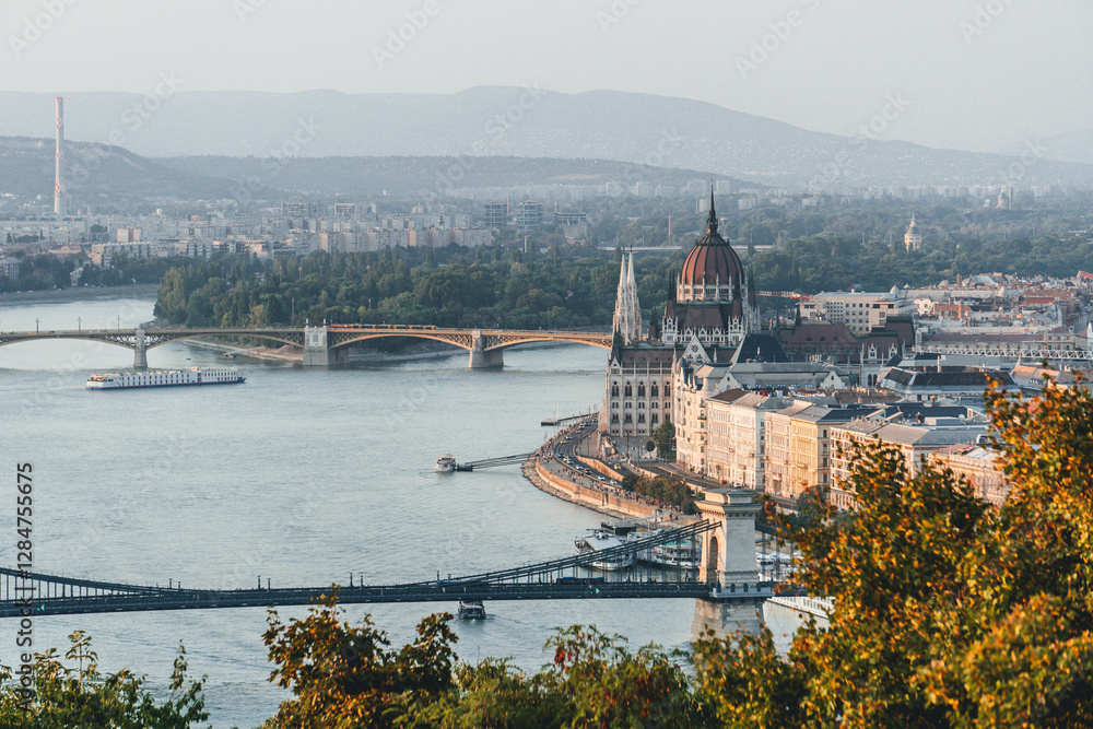 Fototapeta premium chain bridge over river with beautiful stone made design over danube hungary and parliament behind