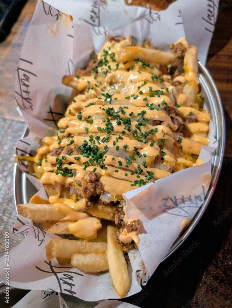 Delicious served taco fries at restaurant, tasty food, decorated dinner plate background