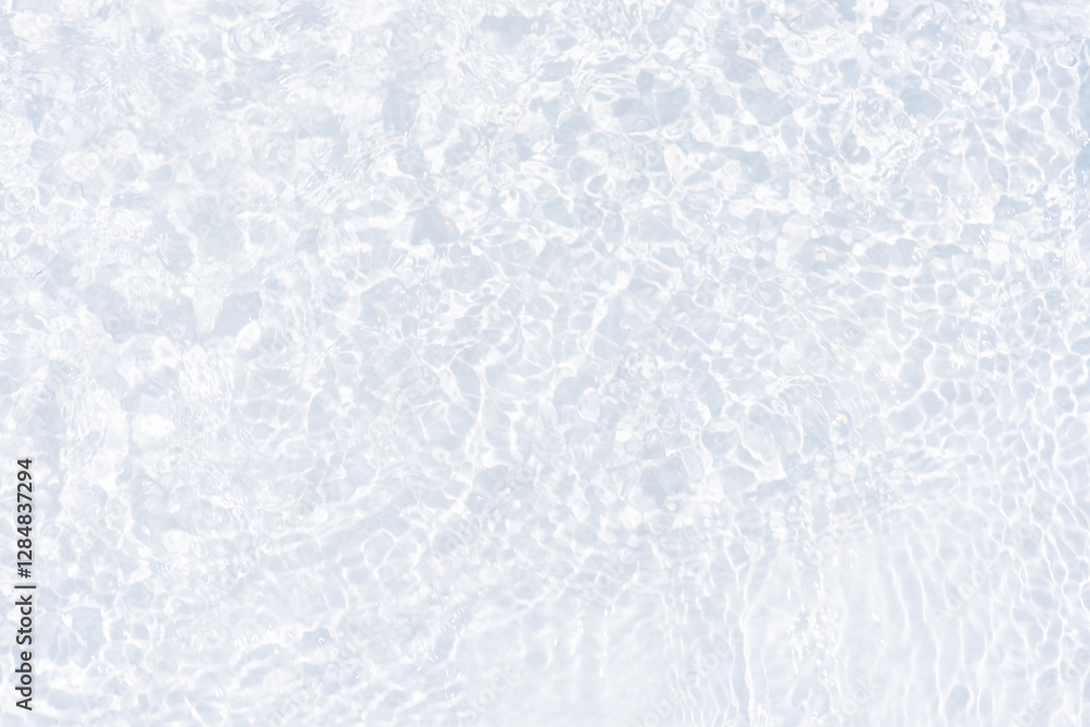 White water with ripples on the surface. Defocus blurred transparent white colored clear calm water surface texture with splashes and bubbles. Water waves with shining pattern texture background. White water with ripples on the surface. Defocus blurred transparent white colored clear calm water surface texture with splashes and bubbles. Water waves with shining pattern texture background.