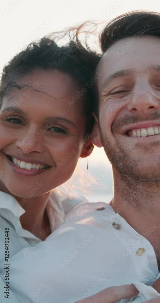 Holiday, couple and face with hug on beach, travel vacation and memory for valentines day. Ocean, man and woman with love embrace for relationship, bonding and adventure in portrait for anniversary Holiday, couple and face with hug on beach, travel vacation and memory for valentines day. Ocean, man and woman with love embrace for relationship, bonding and adventure in portrait for anniversary