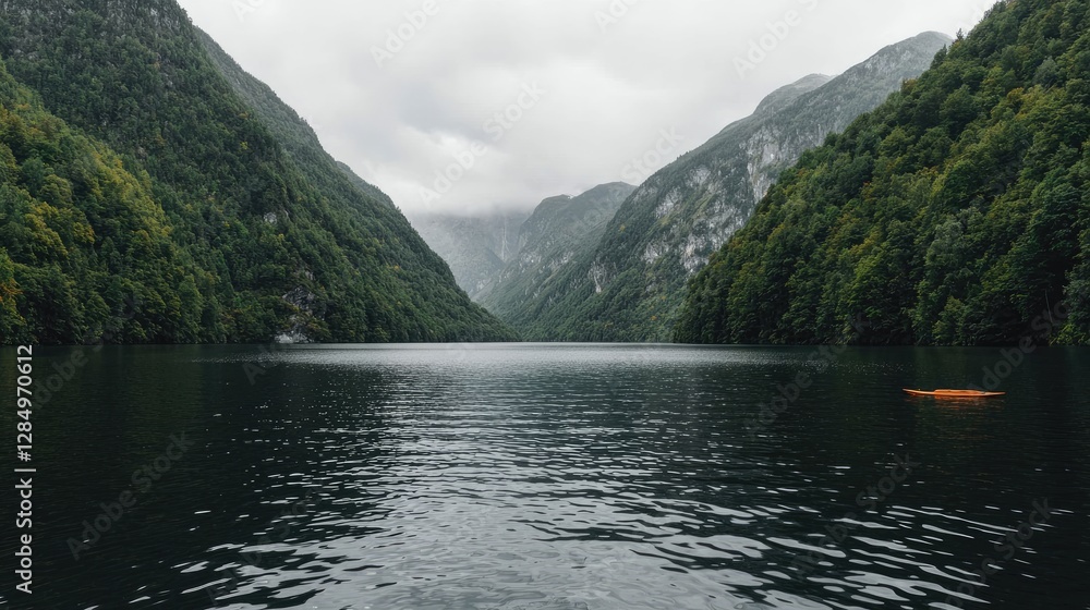 Serene mountain lake, misty valley, boat, calm water, nature travel Serene mountain lake, misty valley, boat, calm water, nature travel