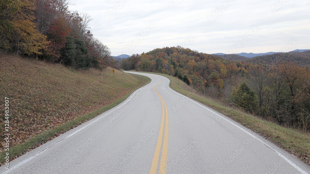Fototapeta premium Winding autumn road, scenic hills, fall foliage, travel
