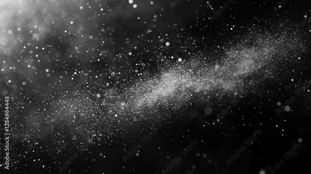 Obraz premium A high-contrast black and white abstract background featuring scattered particles, creating a dynamic texture for artistic and design projects.