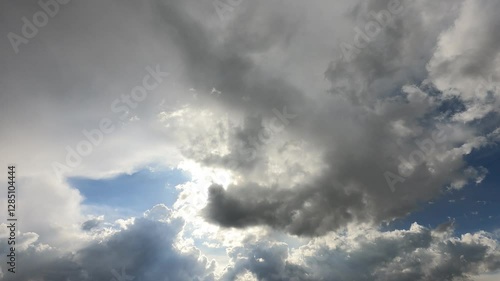 dramatic sky with stormy gray clouds, Hurricane rainy weather nature background. Dark gray sky at sea. B roll footage of Cloudscape screen  Windy weather, summer.4K sunset