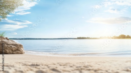 A serene view of a beach with soft ripples
