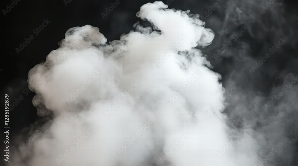 Obraz premium White Smoke Puffs and Fog Dramatic Effect Against Black Background Ideal for Overlay or Background Use in Design Projects
