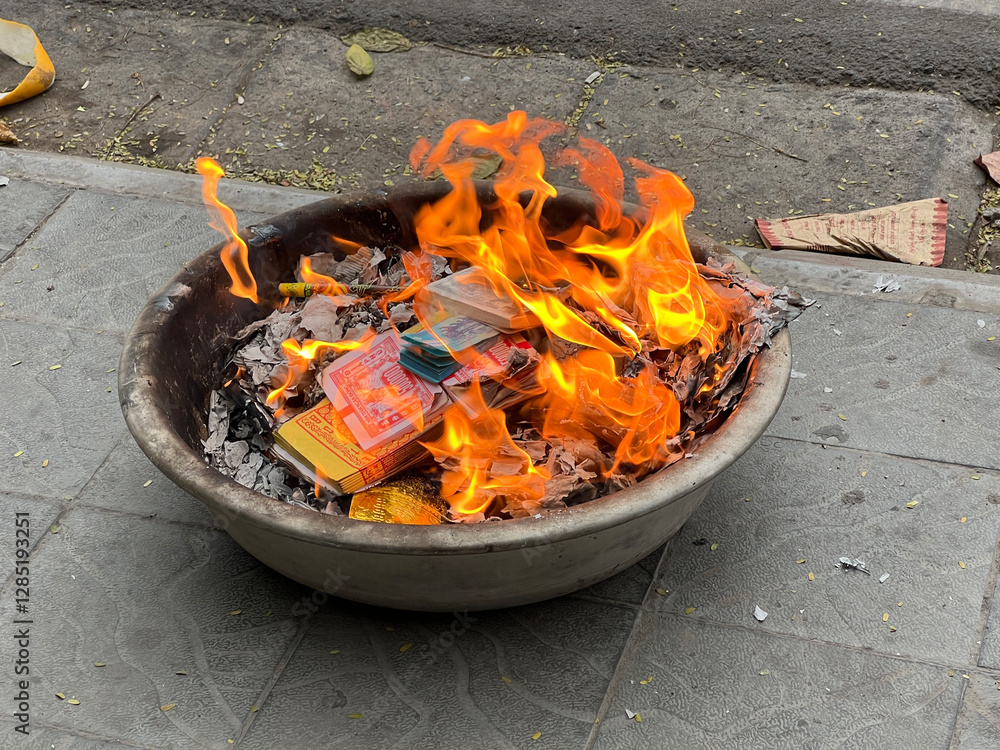 Burning paper for the tet new year in the streets of Hanoi