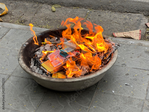 Obraz na płótnie Burning paper for the tet new year in the streets of Hanoi w salonie