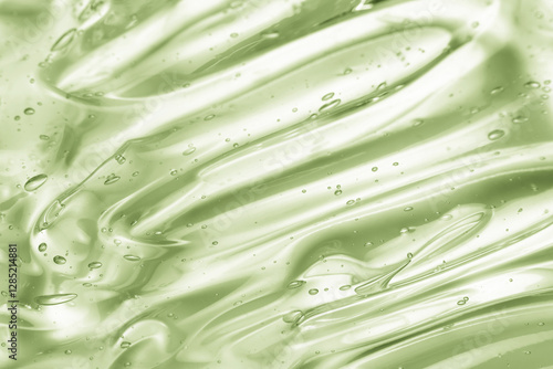 Green gel texture. Aloe vera cosmetic cream background