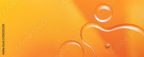Fotografie Vitamin C serum oil texture background