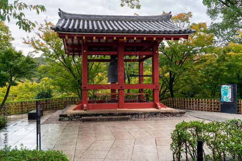 Byodo-in Shoro (Bell Tower) of the Buddhist temple Byodo-in on a cloudy autumn day, Uji, Kyoto Prefecture, Japan photo