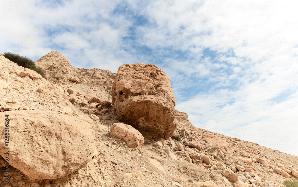 Huge boulders on mountain slopes in Arugot Stream Nature Reserve near Dead Sea in southern Israel Huge boulders on mountain slopes in Arugot Stream Nature Reserve near Dead Sea in southern Israel