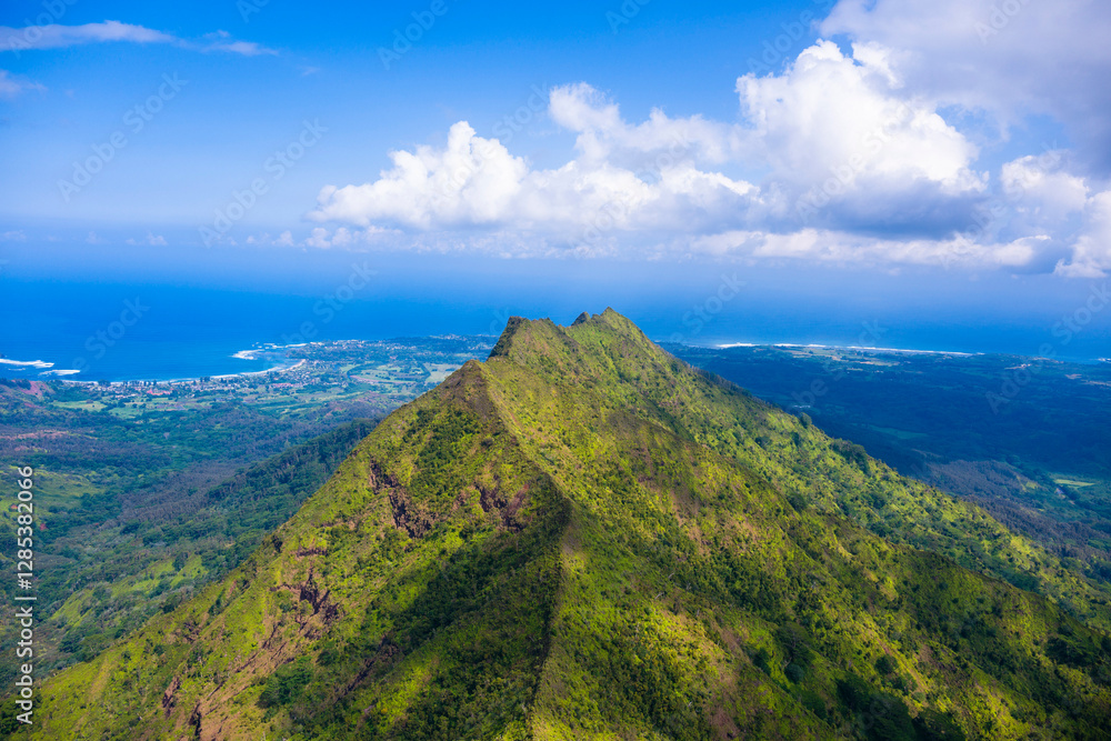 Aerial View of Mount Sleeping Giant on Kauai Island with Pacific Ocean and Coastal Town, Hawaii Aerial View of Mount Sleeping Giant on Kauai Island with Pacific Ocean and Coastal Town, Hawaii
