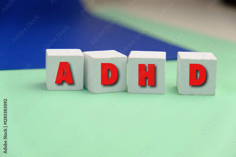 Obraz premium ADHD word alphabet letters on puzzle as a background. ADHD stands for Attention deficit hyperactivity disorder
