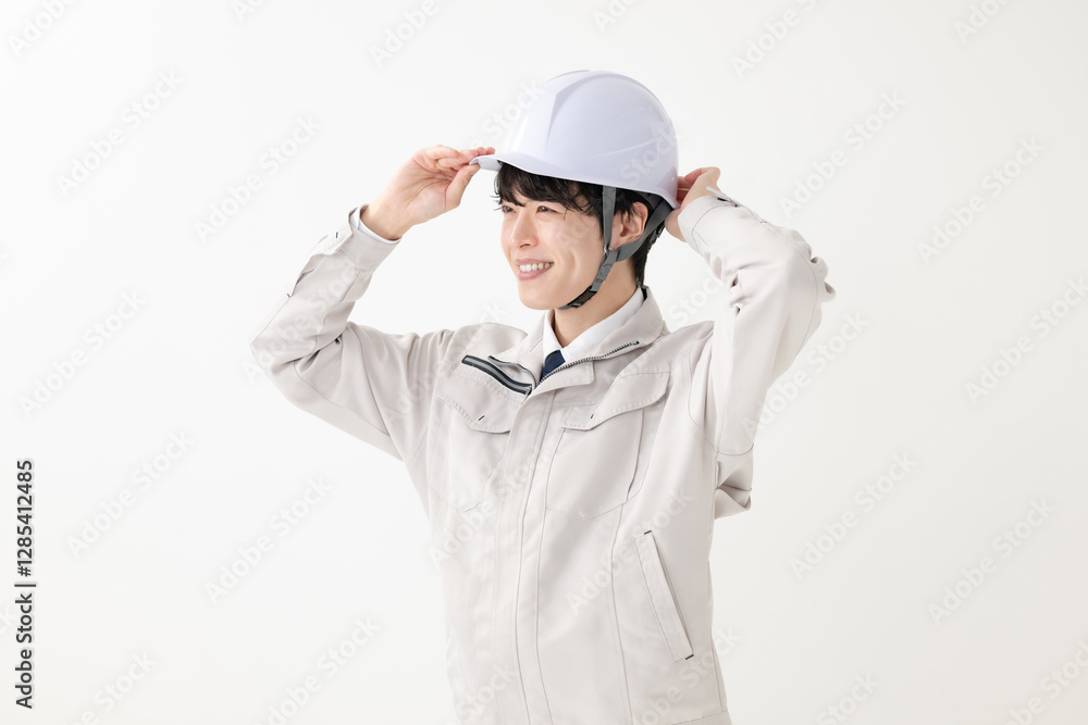 作業服を着た男性 ヘルメット 作業員 作業服を着た男性 ヘルメット 作業員