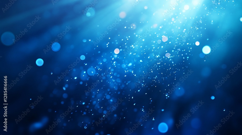 Fototapeta premium Abstract background featuring soft, defocused blue bokeh lights