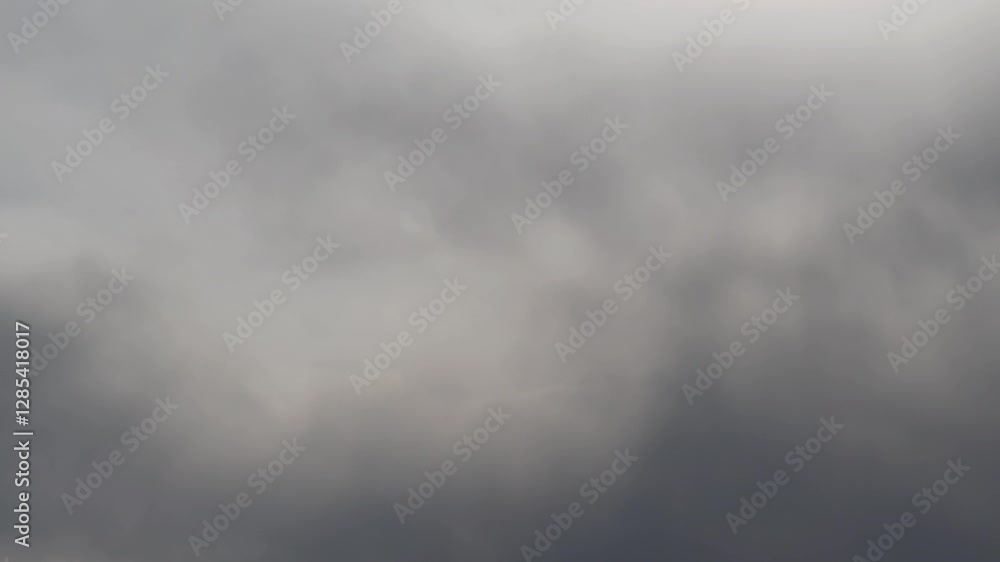 Tokyo, Japan - February 22, 2025: Dramatic moving clouds at Sunset in winter Tokyo, Japan - February 22, 2025: Dramatic moving clouds at Sunset in winter