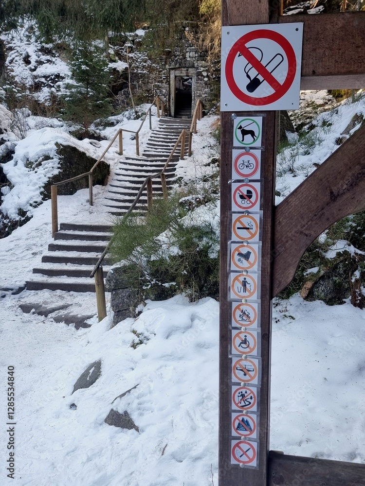Many prohibition signs at the entrance to the rock park