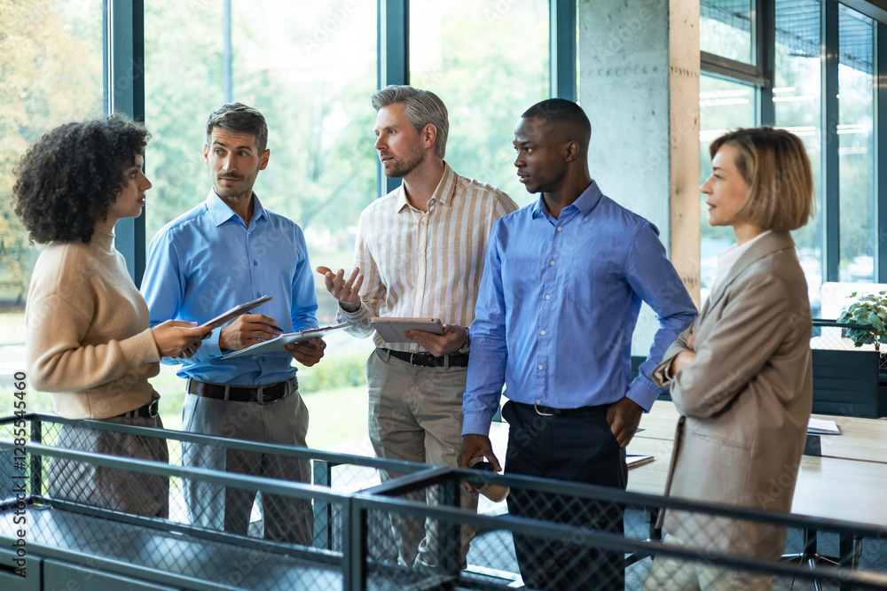 Fotografie Business meeting - manager discussing work with his colleagues.