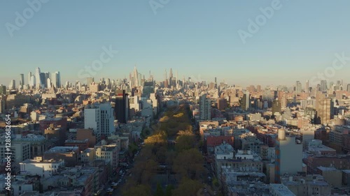Wallpaper Mural Sunlight streaming over Sara D. Roosevelt Park in Manhattan Lower East Side, revealing architectural details and tree lined landscape separating Brooklyn neighborhoods Torontodigital.ca
