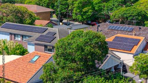 Drone Aerial View of Solar Panels an inner western Sydney Suburban residential Brick house in Sydney  NSW Australia saving the enviroment green energy, goverment subsidy to help clean the  pollution
