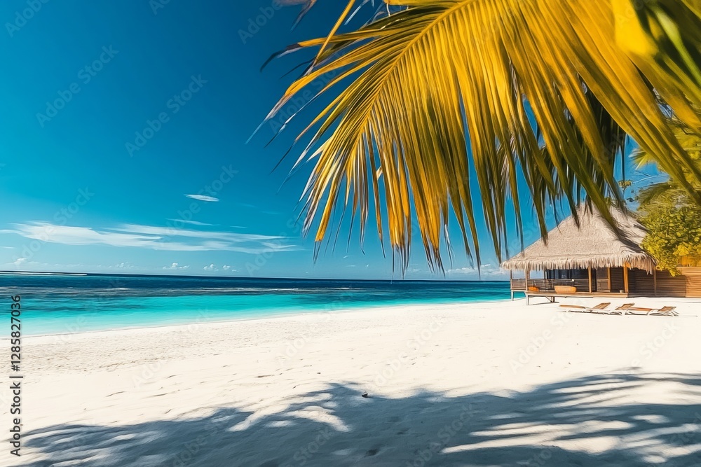 Fototapeta premium Beach with a palm tree and a hut in the background. The sky is blue and the water is calm