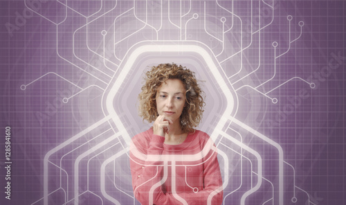 Fotografi Thoughtful woman with technology graphics