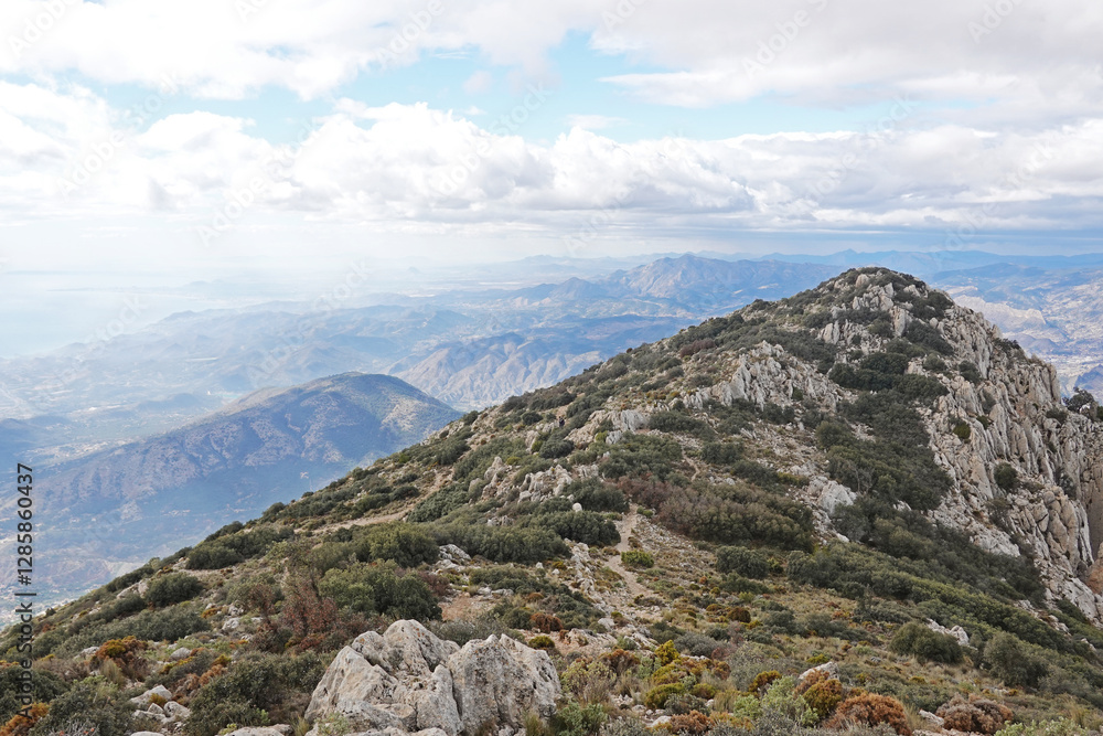 The mountain panorama opening from the hiking path to pick Puig Campana, Finestrat, Benidorm, Spain The mountain panorama opening from the hiking path to pick Puig Campana, Finestrat, Benidorm, Spain