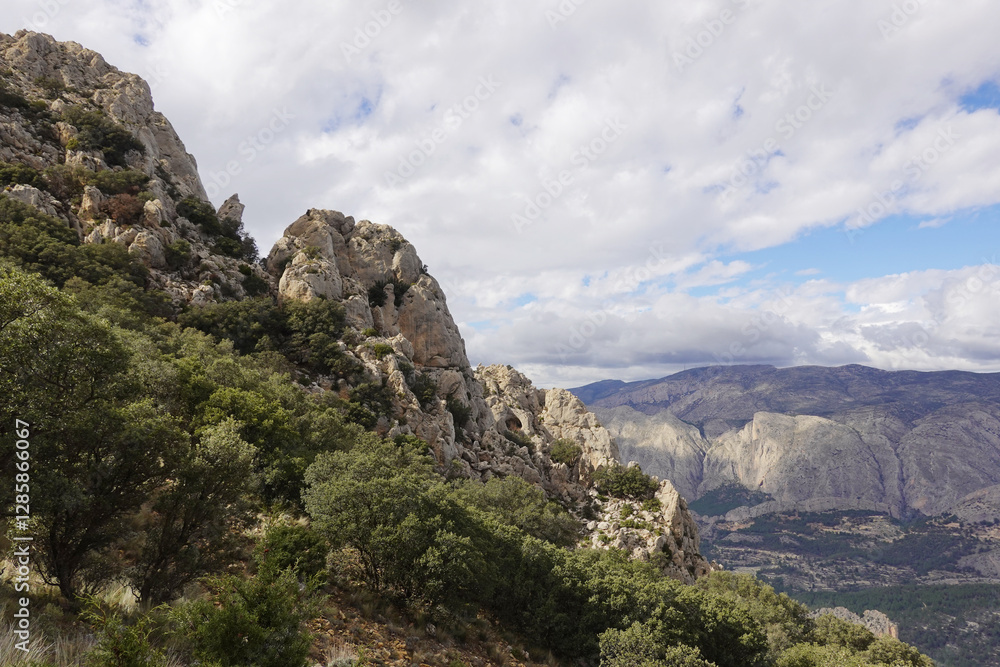 The mountain panorama opening from the hiking path to pick Puig Campana, Finestrat, Benidorm, Spain The mountain panorama opening from the hiking path to pick Puig Campana, Finestrat, Benidorm, Spain