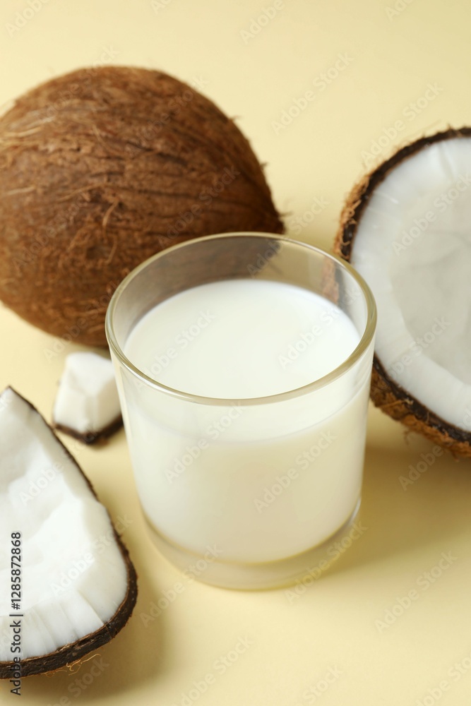 Glass of milk with coconuts on the table Glass of milk with coconuts on the table