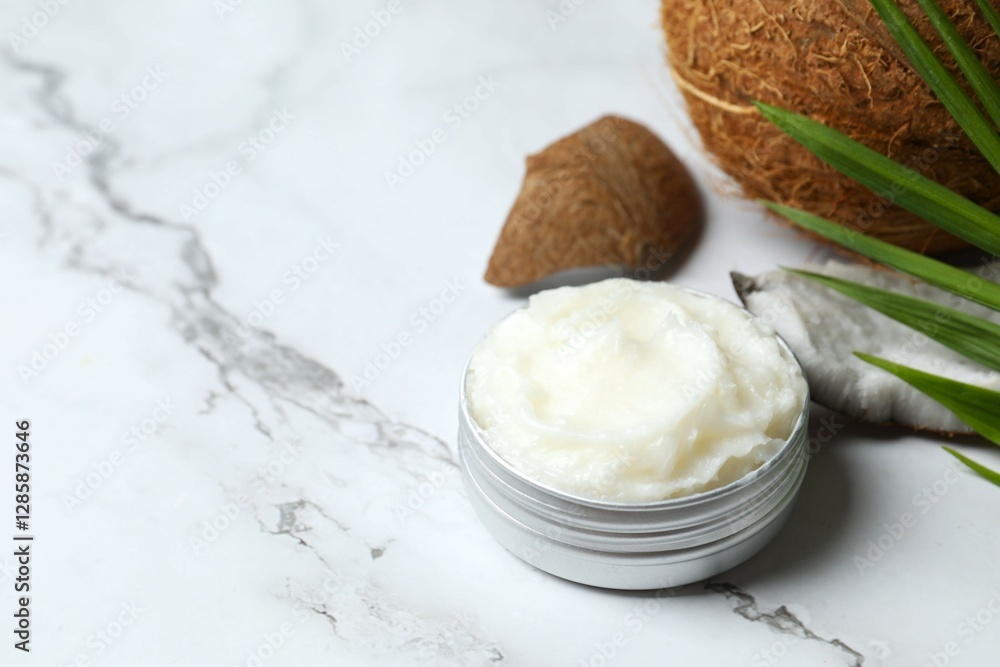 Jar of coconut oil on table Jar of coconut oil on table