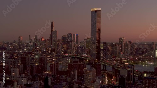Wallpaper Mural Golden sunlight illuminating One Manhattan Square residential skyscraper in Two Bridges district of Manhattan, urban landscape from elevated aerial perspective Torontodigital.ca