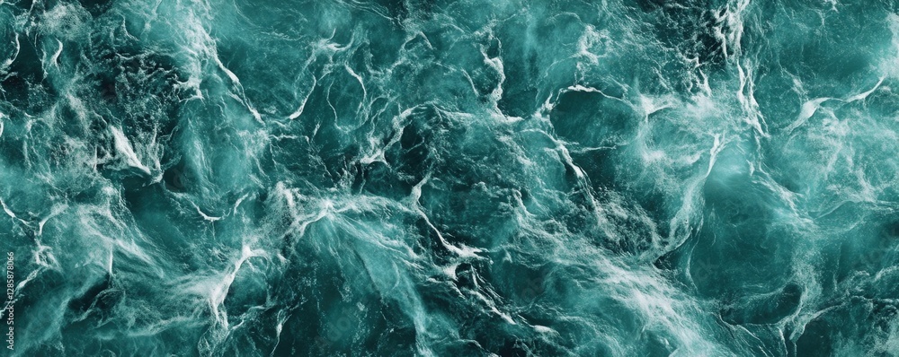 Obraz premium A close-up view of blue water texture, with soft waves and a peaceful flow.