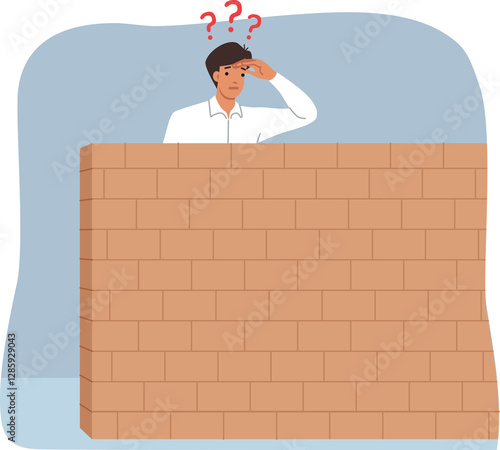 Obraz na płótnie Business man looks behind stone barrier in search of new opportunities for career growth. Curious guy stands near barrier and wonders how to overcome problems that have arisen on path to success. w salonie