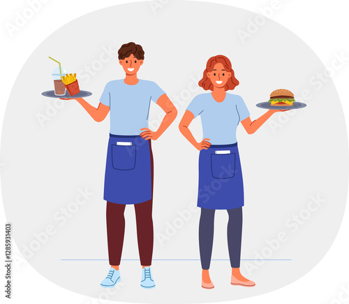 Obraz na płótnie Waiters from fast food restaurant work together to deliver customers order, holding burgers and fries on trays. Man and woman working as waiters in cafe, enjoying jobs in hospitality industry w salonie