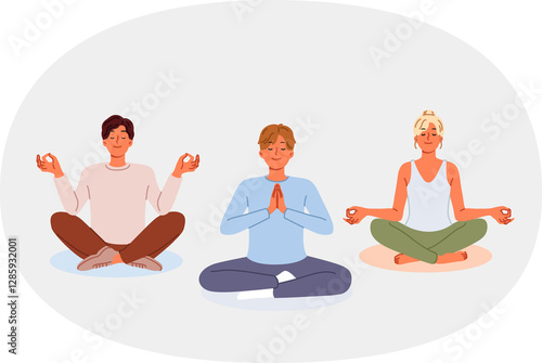 Obraz na płótnie Group of people meditate sitting in lotus position, visiting yoga studio or learning buddhist practices. Woman and two men are marking to achieve harmony between soul and body or achieve zen. w salonie