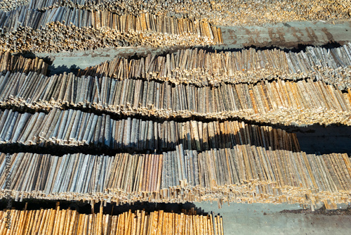 Logs stored in a sawmill for further processing as building material and energy resource