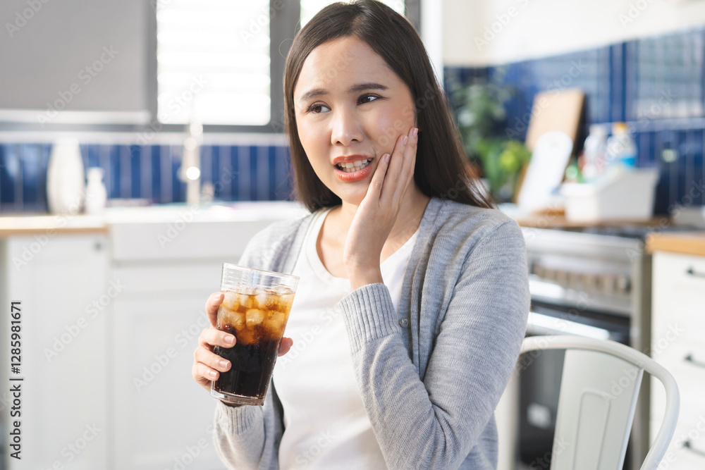 Health care asian young woman touching mouth, expression, girl suffering from toothache, decay or sensitivity cavity molar tooth or inflammation drink cold, sparkling water. Sensitive teeth people. Health care asian young woman touching mouth, expression, girl suffering from toothache, decay or sensitivity cavity molar tooth or inflammation drink cold, sparkling water. Sensitive teeth people.