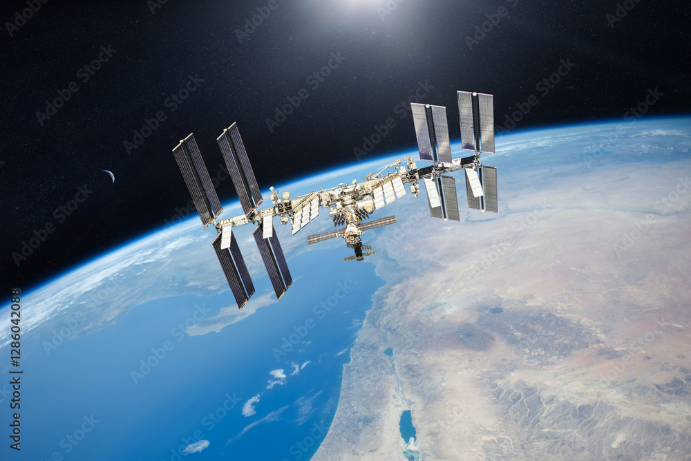 custom made wallpaper toronto digitalInternational Space Station on low-orbit of Earth with sun rays. 